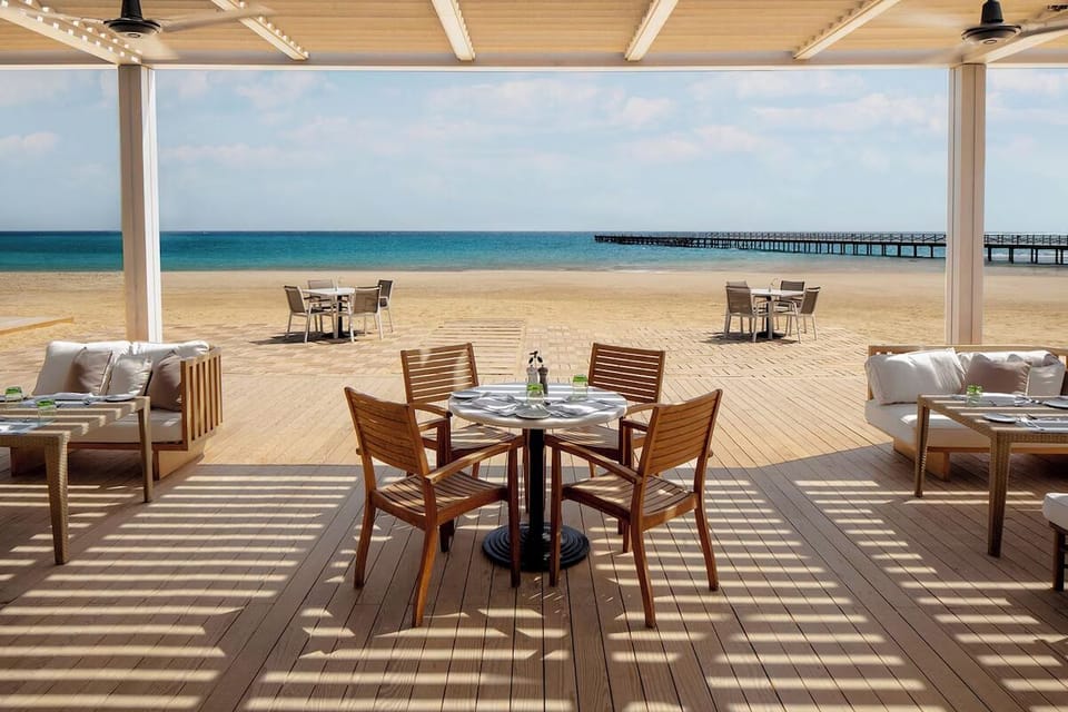 Sip morning coffee on the deck with endless ocean views.