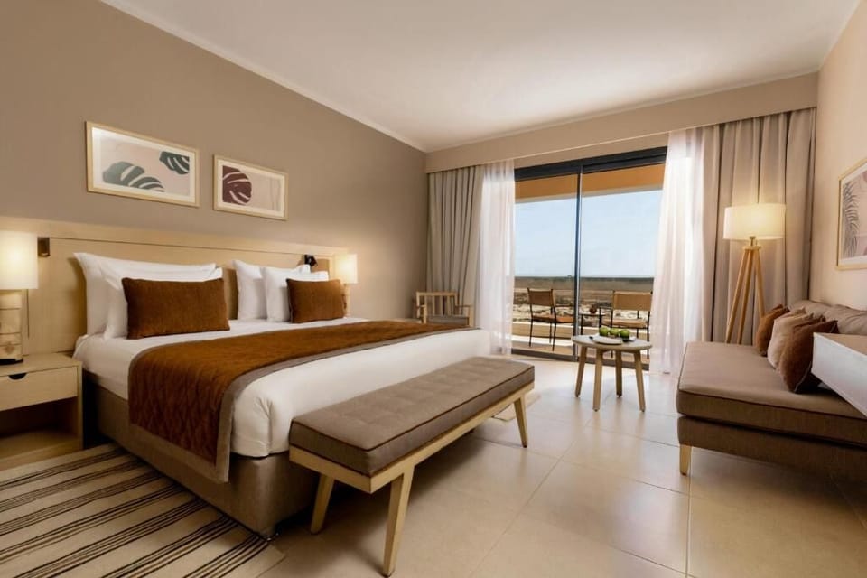 Stretch out on plush bedding and sip coffee by the terrace.