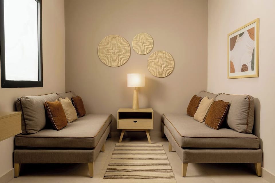 Relax on cozy daybeds in a calm, private nook.