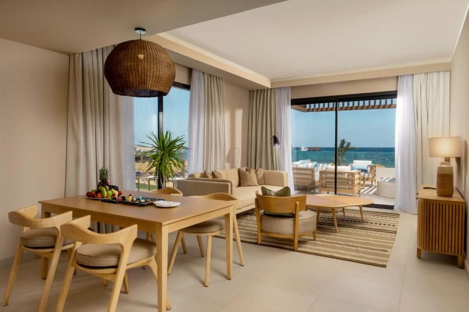 Gather for sunset drinks with airy lounge and sea views.