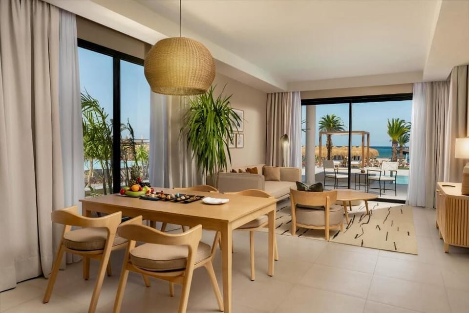 Gather for relaxed meals with seamless indoor-outdoor lounging.
