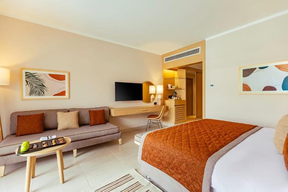 Stretch out in a spacious suite with sofa and work desk.