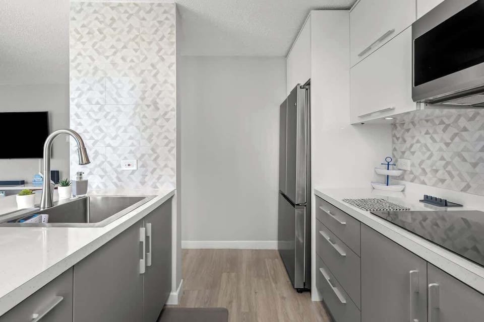 Keep your groceries fresh! Our full-sized refrigerator provides ample space for all your drinks and snacks, making your stay feel just like home.