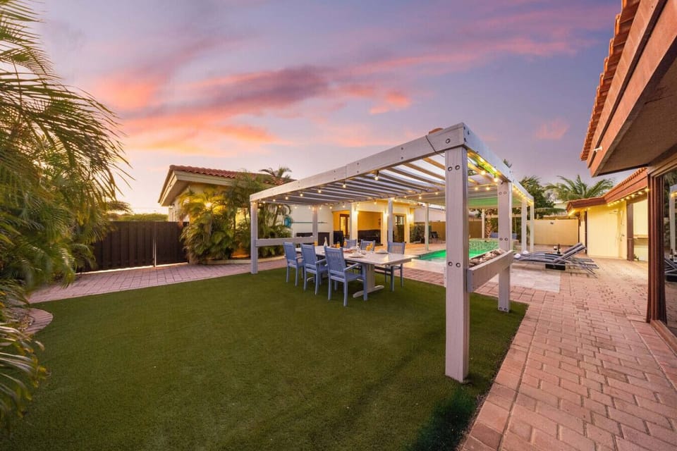 Share a meal under the shade, surrounded by greenery and fresh air.