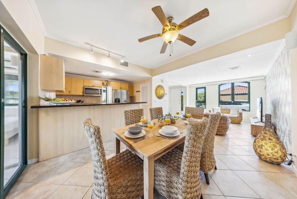 Enjoy a lovely meal in your dining area, complete with a beautiful dining set.