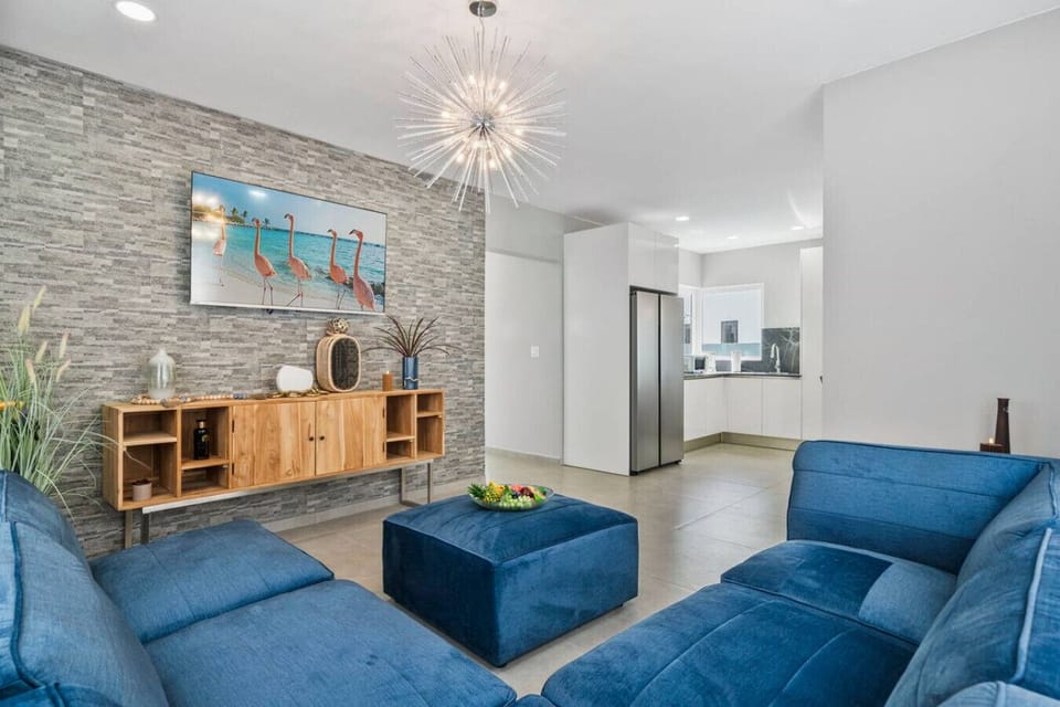 Modern living room with chic décor and comfy seating.