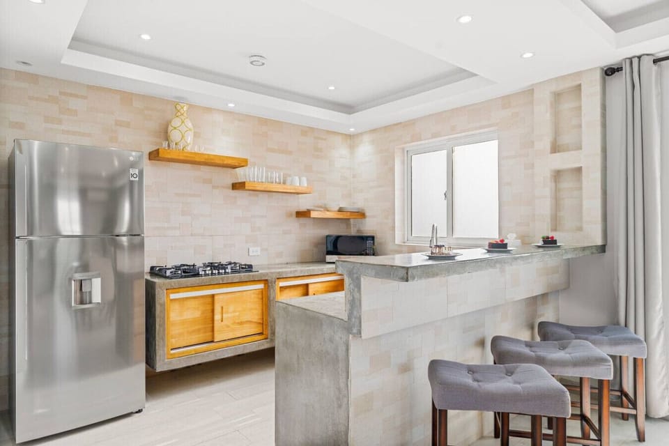 Kitchen with stove and microwave