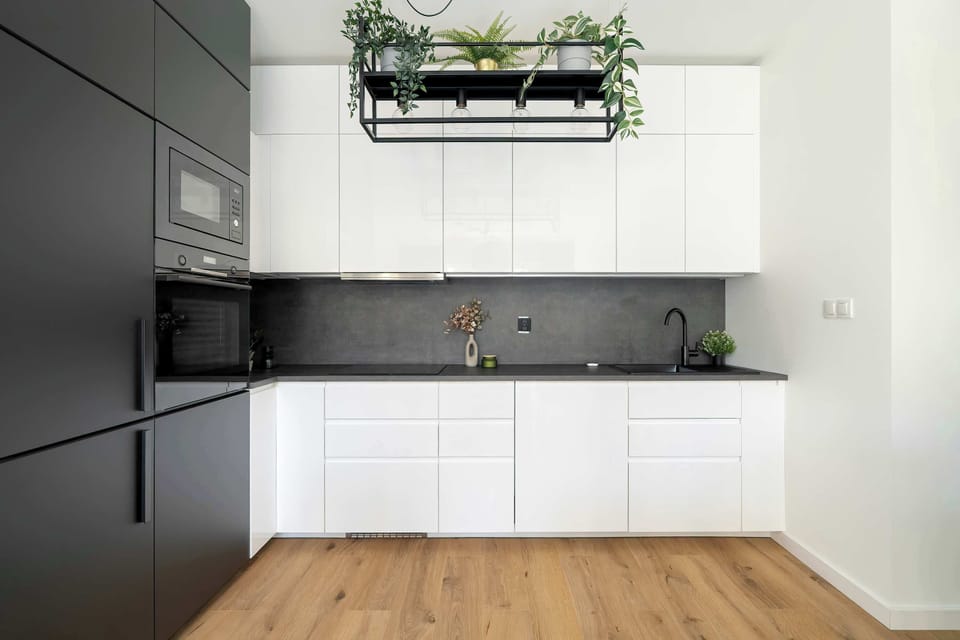 The fully equipped kitchenette includes everything you need for a home-cooked meal.