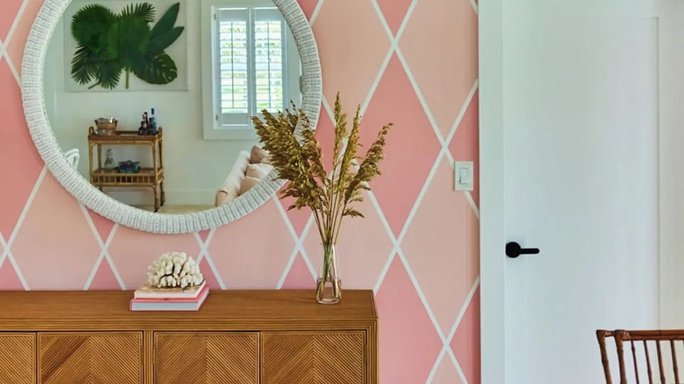 Sink into dreamy comfort with balcony views and tropical breezes.