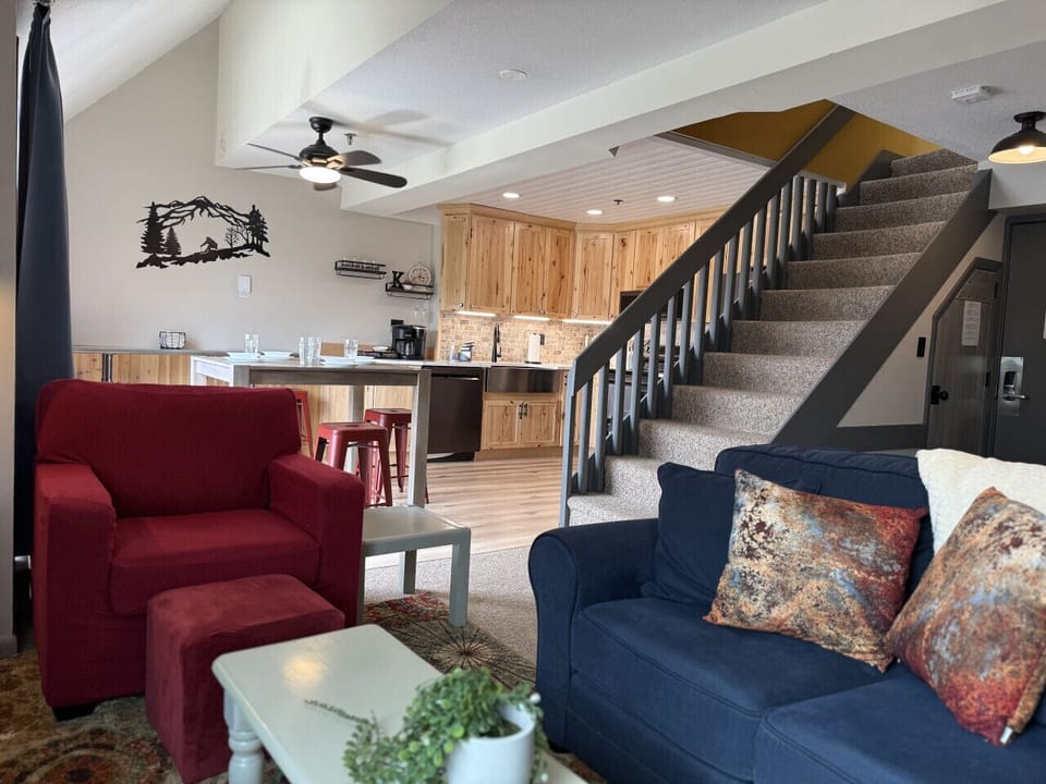 Open living space with staircase and seating