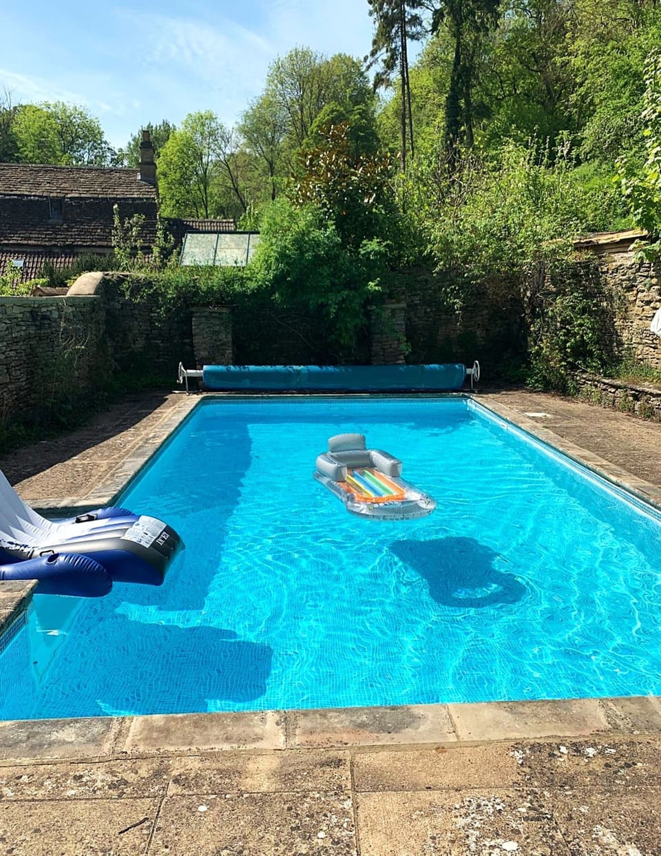 The heated outdoor swimming pool at Preedy's Cottage, Cotswolds