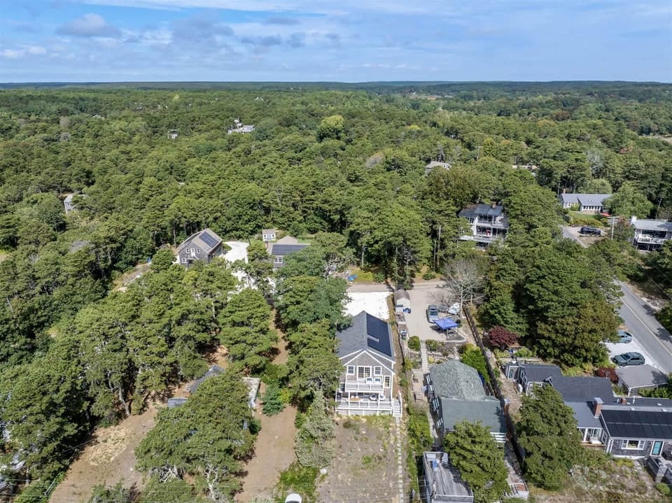 Birds-eye perspective of the peaceful bayside neighborhood enclave.