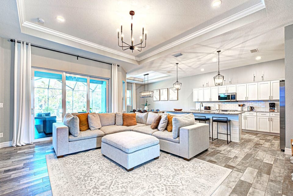 Living area with view of dining area and kitchen