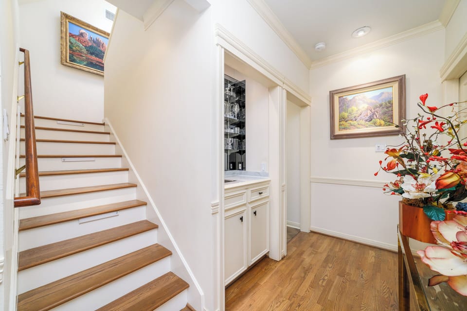 Wet bar, staircase to second floor