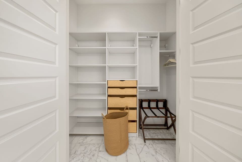 Bathroom includes a large closet.