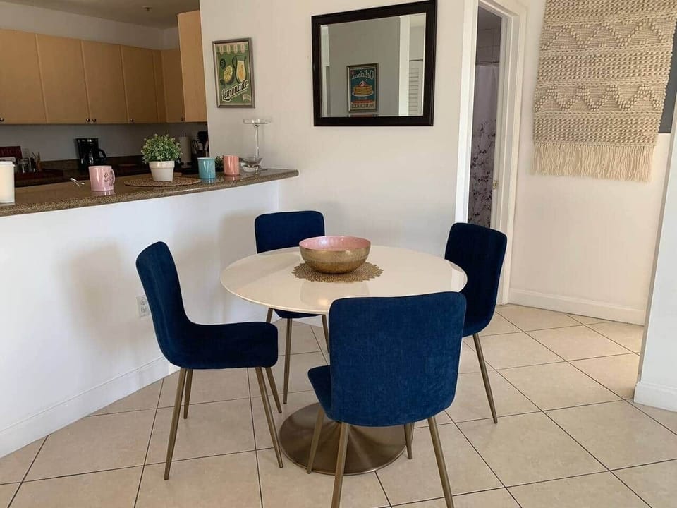 Beautiful CB2 dining table that seats four people