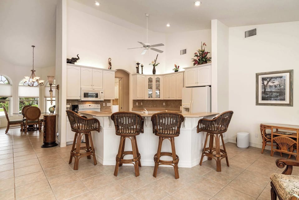 4 bar stools at kitchen island for eating