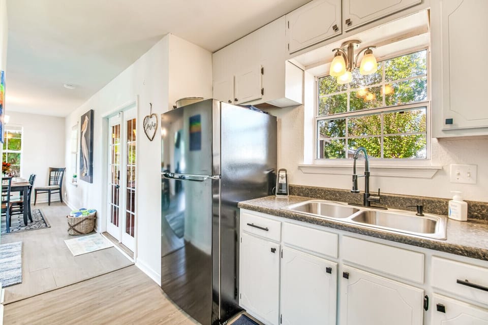 Kitchen | Stainless Steel Appliances with Coffee Bar & Modern White Cabinets