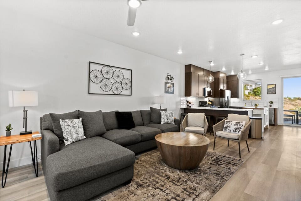 Living Room Oasis: Stylish furnishings and bright views create the perfect gathering space!