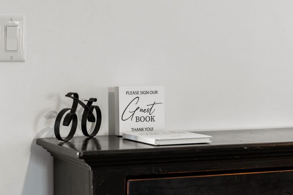 Guest Interaction Corner: Capture memories in our charming guest book and leave your mark!