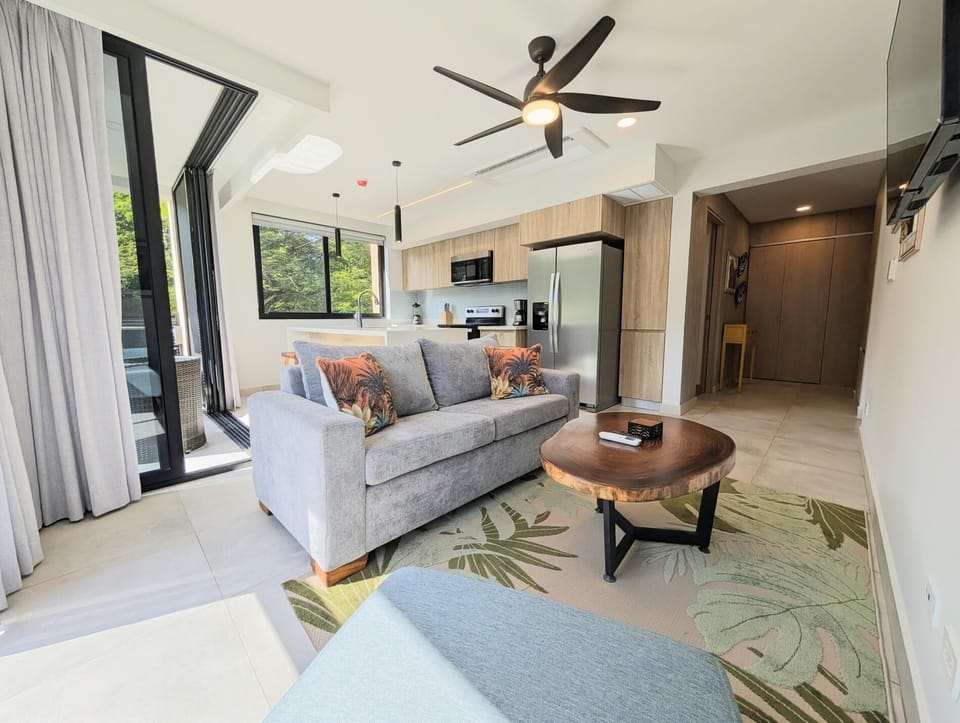 Living room with sofabed and TV