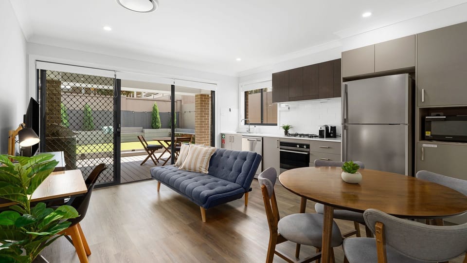 Modern kitchen with all essentials provided.