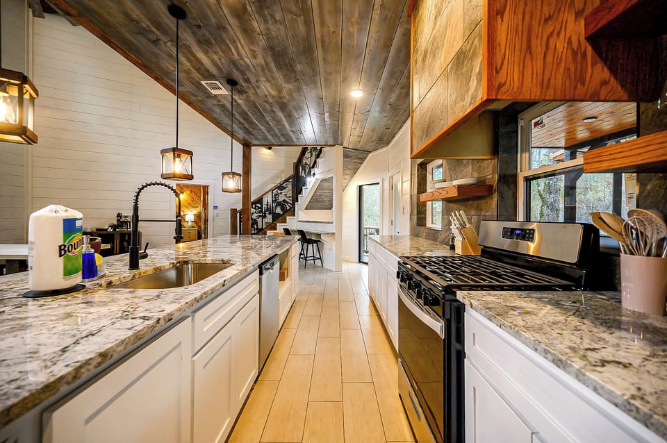 Oversized kitchen counter where the whole family can gather while cooking!