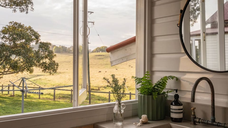 Morning light and open views from the bathroom window.
