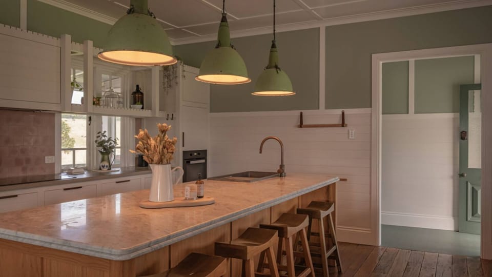 Open kitchen with natural light and timber finishes.