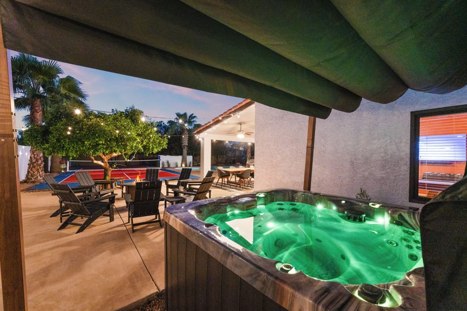 Private hot tub beside lounge and Sports Court for relaxing Scottsdale nights.