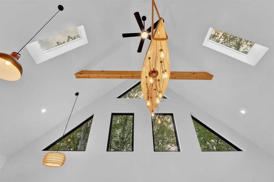 Statement chandelier & exposed beams