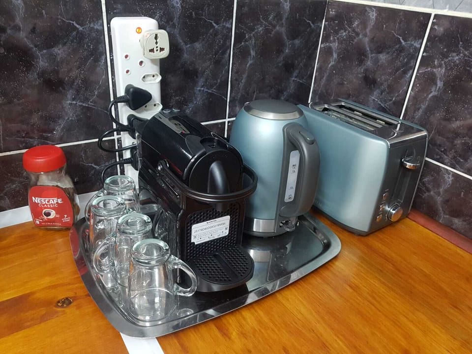 Kitchenette with coffee maker, kettle and toaster