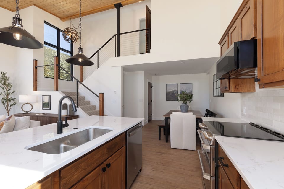 Fully stocked Kitchen leads into dining room