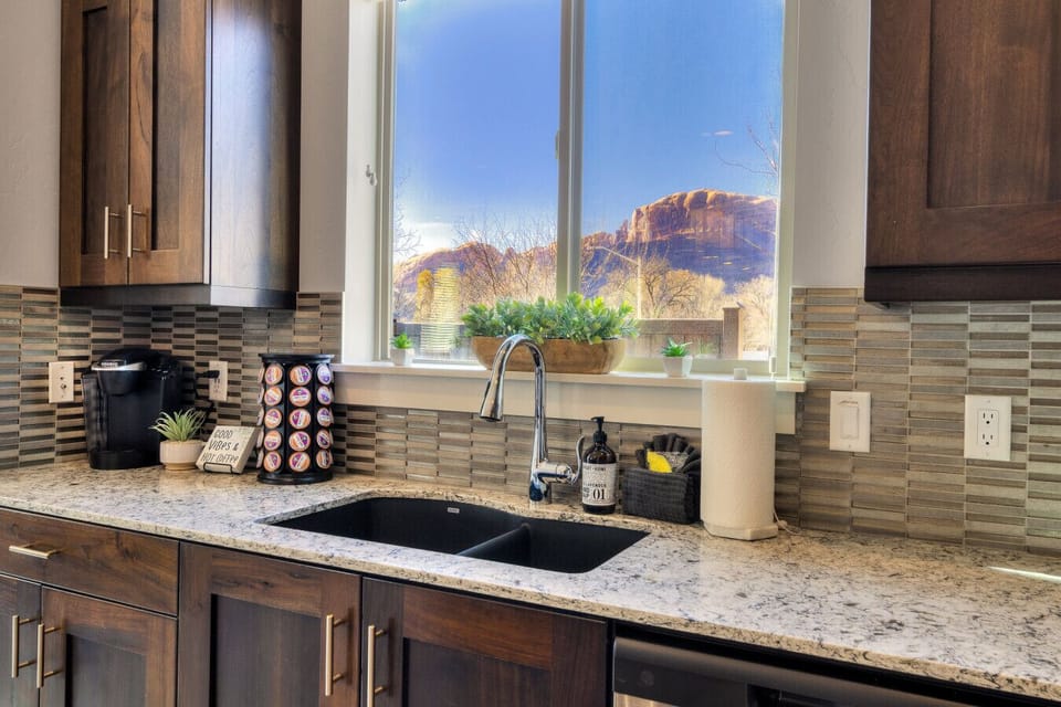 A dedicated coffee setup featuring a Keurig with a generous supply of pods, plus a traditional drip coffee maker for those who prefer a classic brew—so whether you’re grabbing a quick cup or settling in for a slower morning, you’re covered.