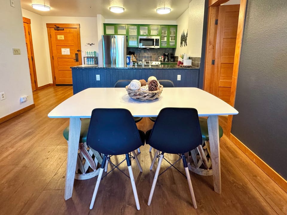 Dining area opens to kitchen.