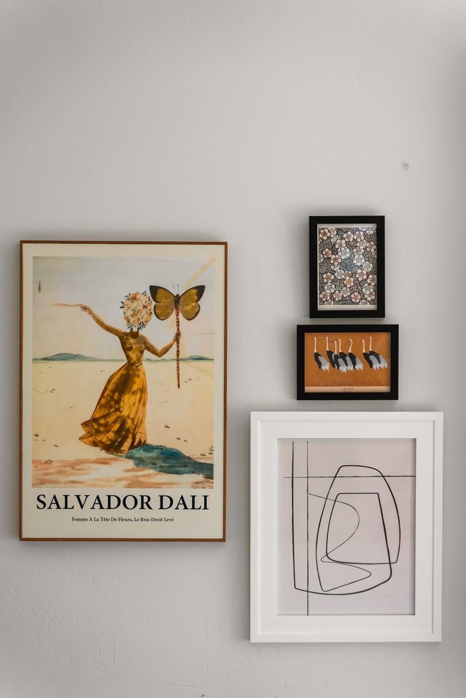 A fun gallery wall to greet you with charm and color