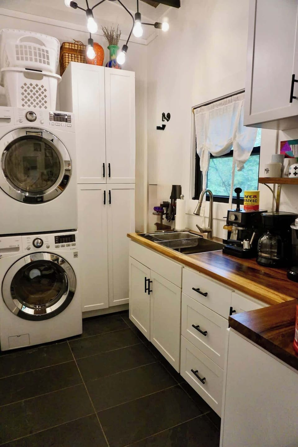 Full laundry room with washer and dryer—pack light and stay fresh.