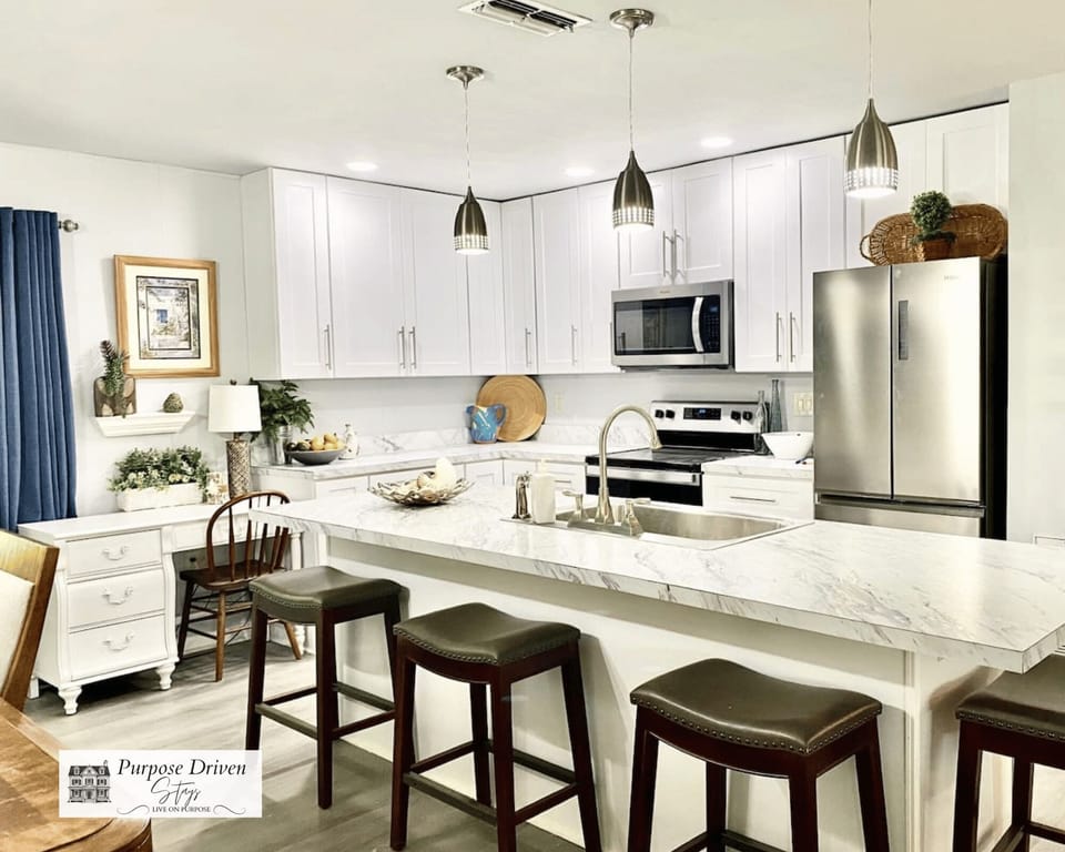 A great open concept updated kitchen to gather with your group and enjoy meals!