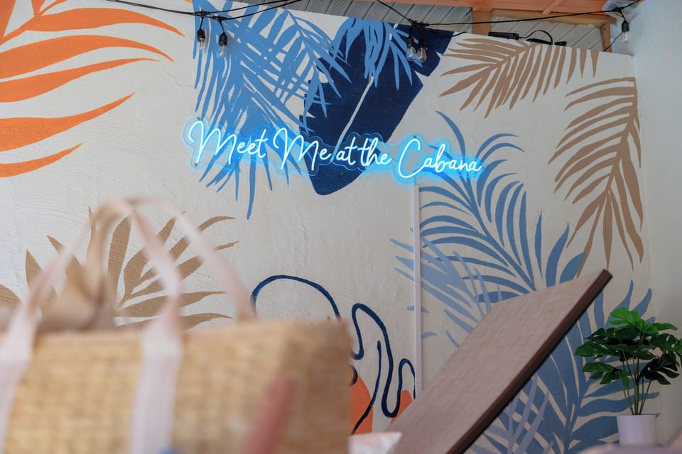 Vibrant outdoor lounge with neon glow — perfect for sunset vibes & relaxation!