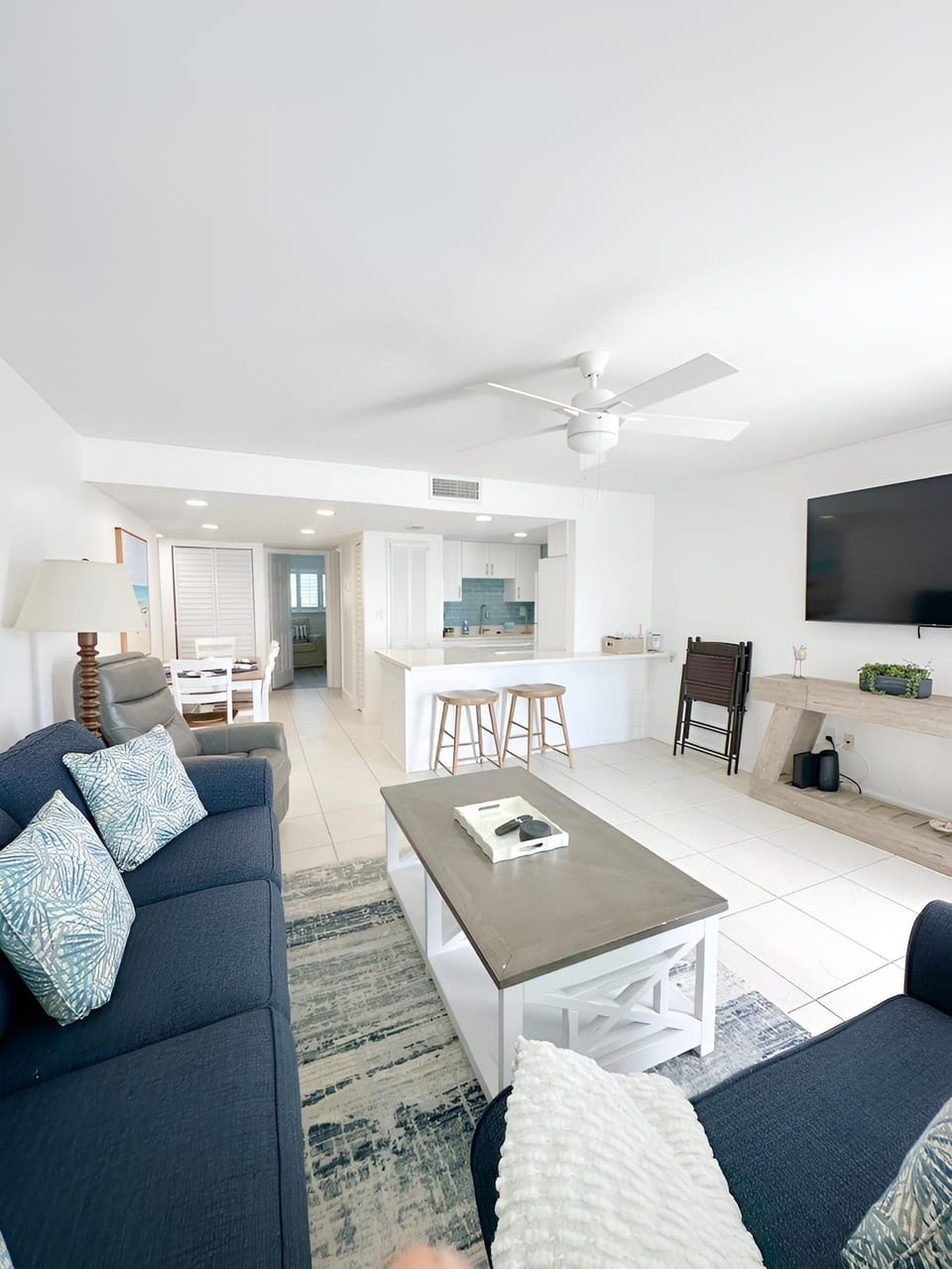 Living room showing dining and kitchen