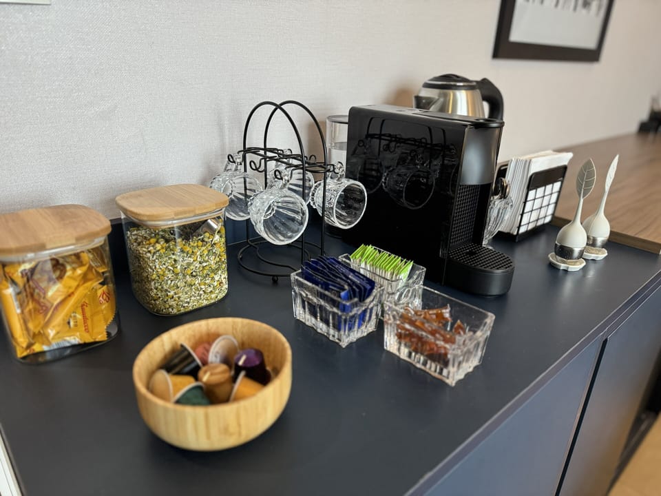 Herbal tea, espresso coffee and cookies