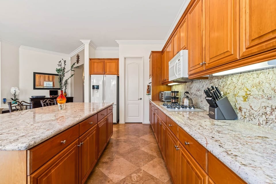 Enjoy the heart of the home in this fully equipped gourmet kitchen, designed for both style and conv