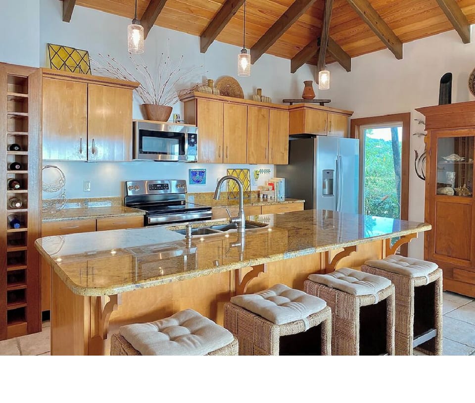 Well stocked kitchen with stainless appliances
