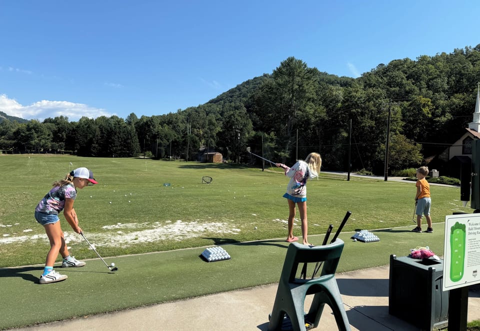One of two gofl courses at Rumbling Bald. Driving ranges free for guest use. 