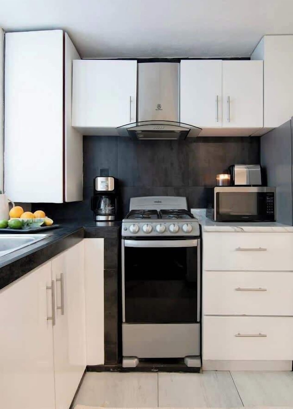 Fully equipped kitchen with modern appliances, perfect for preparing everything from quick breakfasts to full home-cooked meals.