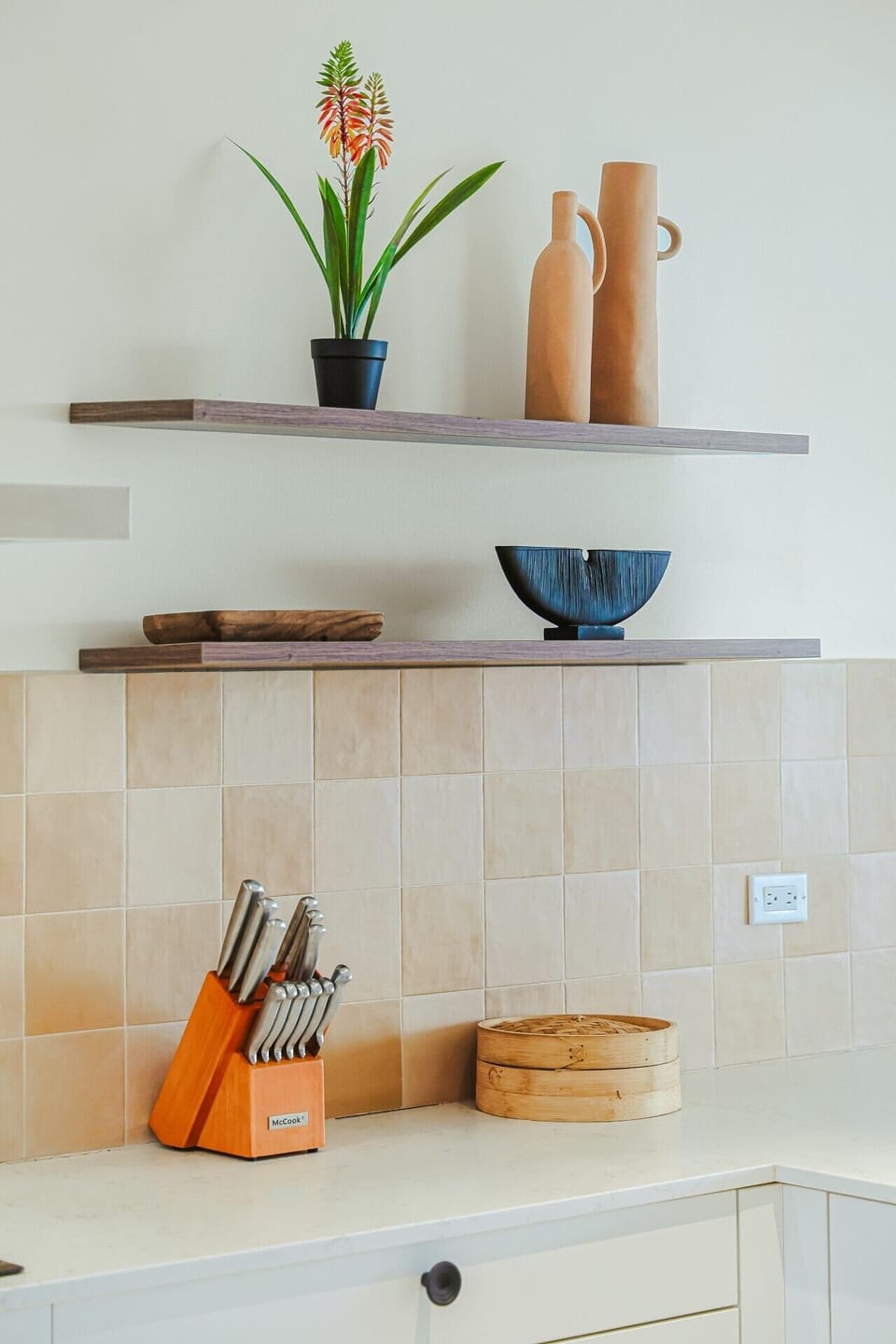 Fully equipped kitchen featuring modern appliances, cookware, essentials, and ample space for meal preparation.