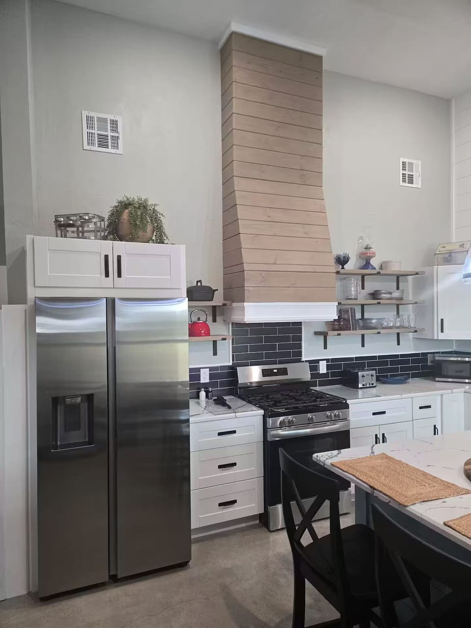 Full side-by-side fridge and 5-burner gas range with convection air fry
