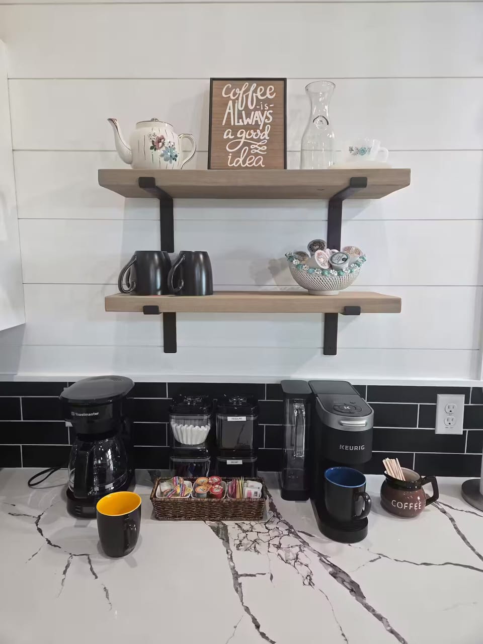 Full coffee bar with an assortment of cocoa, teas, Kuerig pods and ground coffee
