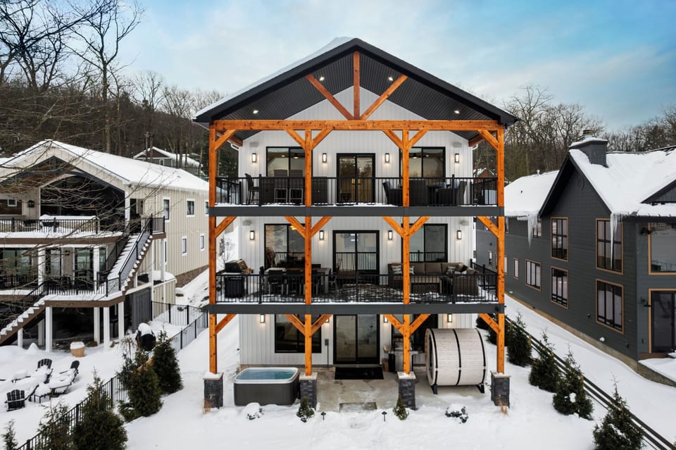 Blue Haven glowing at dusk after a fresh Pocono snowfall