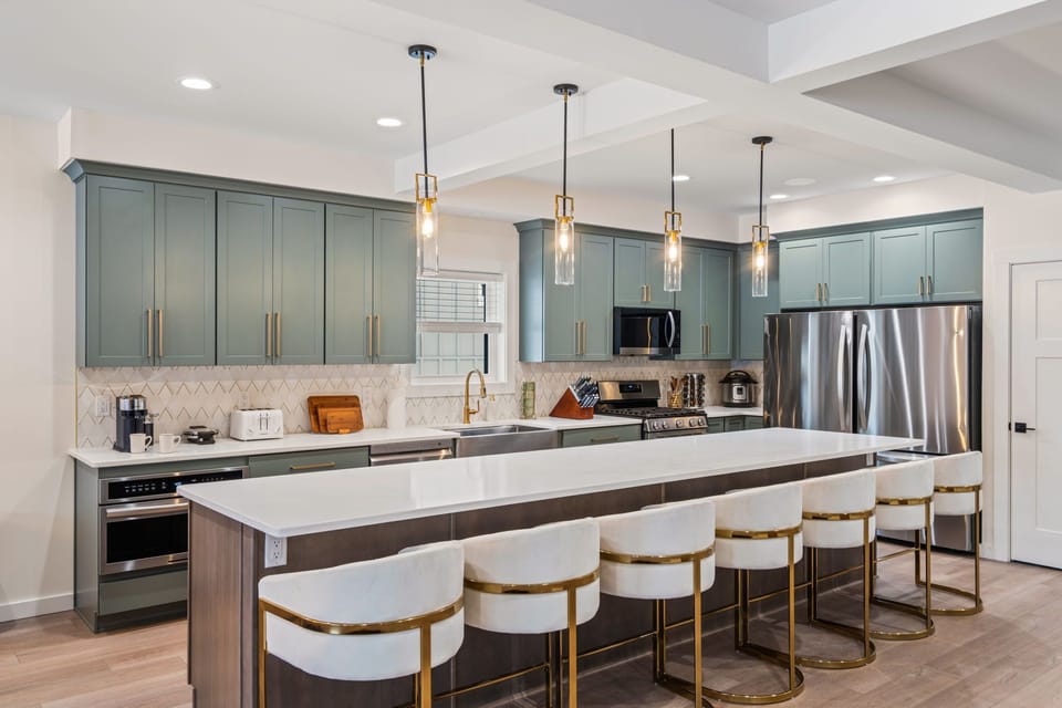 Chef-Inspired Gourmet Kitchen with Spacious Island & Premium Appliances.
